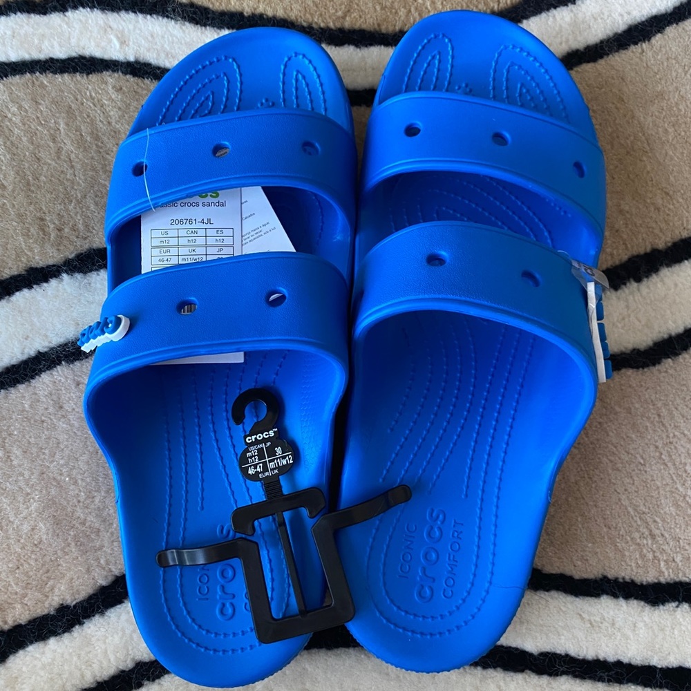 CLASSIC CROCS SLIDE BLUE WITH TWO CROCS JIBBITZ